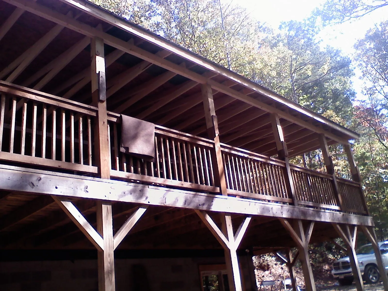 Timber framing under a new elevated porch and deck — Roof Leak Repair in Perkinsville by Roofing Brothers